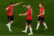 13 November 2022; Jordan McEneff of Derry City celebrates after scoring his side's fourth goal with teammates Mark Connolly, and Brandon Kavanagh during the Extra.ie FAI Cup Final match between Derry City and Shelbourne at Aviva Stadium in Dublin. Photo by Michael P Ryan/Sportsfile