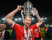 13 November 2022; Shane McEleney of Derry City celebrates with the FAI Senior Challenge Cup after the Extra.ie FAI Cup Final match between Derry City and Shelbourne at Aviva Stadium in Dublin. Photo by Stephen McCarthy/Sportsfile