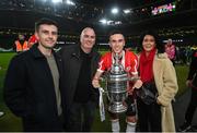 13 November 2022; Derry City's Jordan McEneff and family celebrate with the FAI Senior Challenge Cup after the Extra.ie FAI Cup Final match between Derry City and Shelbourne at Aviva Stadium in Dublin. Photo by Stephen McCarthy/Sportsfile