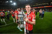 13 November 2022; Jordan McEneff of Derry City celebrates with the FAI Senior Challenge Cup after the Extra.ie FAI Cup Final match between Derry City and Shelbourne at Aviva Stadium in Dublin. Photo by Stephen McCarthy/Sportsfile