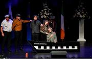 12 November 2022; An Clochán Liath team, representing Donegal and Ulster of; Adrian Alcorn, Kathleen Bonner, Maria Gallagher, Geraldine Walsh, Martin Mc Shea, Terence Oglesby, Daire Boyle and Eugene Mc Garvey in the Nuachleas competition during the Scór Sinsir 2022 All-Ireland Finals at TF Royal Theatre in Castlebar, Mayo. Photo by Piaras Ó Mídheach/Sportsfile