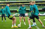 14 November 2022; Seamus Coleman, centre, with teammate, from left, Callum O'Dowda, Matt Doherty and Liam Scales during a Republic of Ireland training session at the Aviva Stadium in Dublin. Photo by Seb Daly/Sportsfile