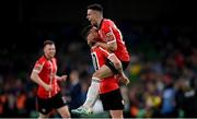 13 November 2022; Jordan McEneff, right, celebrates with Derry City team-mate Patrick McEleney after scoring their side's fourth goal during the Extra.ie FAI Cup Final match between Derry City and Shelbourne at Aviva Stadium in Dublin. Photo by Stephen McCarthy/Sportsfile