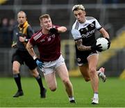 13 November 2022; Dylan Ward of Kilcoo in action against Colm Lennon of Ballybay Pearses during the AIB Ulster GAA Football Senior Club Championship Quarter-Final match between Kilcoo and Ballybay Pearse Brothers at St Tiernach's Park in Clones, Monaghan. Photo by Brendan Moran/Sportsfile