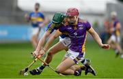 13 November 2022; Brendan Scanlon of Kilmacud Crokes  n action against Diarmaid Conway of Clough/ Ballacolla during the AIB Leinster GAA Hurling Senior Club Championship Quarter-Final match between Kilmacud Crokes and Clough/Ballacolla at Parnell Park in Dublin. Photo by Sam Barnes/Sportsfile