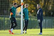 16 November 2022; Goalkeepers Mark Travers, left, and Caoimhin Kelleher, centre, with goalkeeping coach Dean Kiely during a Republic of Ireland training session at the FAI National Training Centre in Abbotstown, Dublin. Photo by Seb Daly/Sportsfile