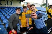 17 November 2022; Nic White takes a selfie with students of Templecarrig, from left, Reece Gamble, Cillian Hingerty and Dylan Potts during an Australia rugby meet and greet at the Belfield Bowl in UCD, Dublin. Photo by David Fitzgerald/Sportsfile