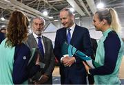 17 November 2022; An Taoiseach Micheál Martin TD with Sport Ireland board chairperson Kieran Mulvey and Irish Women's rugby players Emily Lane, left, and Megan Burns during the launch of the Next Phase of the Sport Ireland Campus Masterplan at the National Indoor Arena in Dublin. Photo by David Fitzgerald/Sportsfile