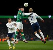 17 November 2022; Matt Doherty of Republic of Ireland in action against Morten Thorsby, right, and Mohamed Elyounoussi of Norway during the International Friendly match between Republic of Ireland and Norway at the Aviva Stadium in Dublin. Photo by Eóin Noonan/Sportsfile