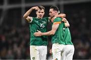17 November 2022; Alan Browne of Republic of Ireland celebrates, his 69th minute goal, with Jayson Molumby and Callum Robinson during the International Friendly match between Republic of Ireland and Norway at the Aviva Stadium in Dublin. Photo by Eóin Noonan/Sportsfile