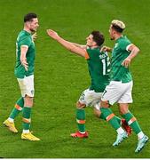 17 November 2022; Alan Browne of Republic of Ireland celebrates, his 69th minute goal, with teammates Jayson Molumby and Callum Robinson, right, during the International Friendly match between Republic of Ireland and Norway at the Aviva Stadium in Dublin. Photo by Ben McShane/Sportsfile