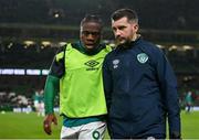 17 November 2022; Republic of Ireland chartered physiotherapist Danny Miller, right, and Michael Obafemi of Republic of Ireland before the International Friendly match between Republic of Ireland and Norway at the Aviva Stadium in Dublin. Photo by Seb Daly/Sportsfile