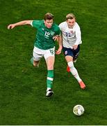 17 November 2022; Nathan Collins of Republic of Ireland and Marcus Holmgren Pedersen of Norway during the International Friendly match between Republic of Ireland and Norway at the Aviva Stadium in Dublin. Photo by Ben McShane/Sportsfile