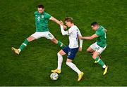 17 November 2022; Martin Ødegaard of Norway in action against Alan Browne, left, and Josh Cullen of Republic of Ireland during the International Friendly match between Republic of Ireland and Norway at the Aviva Stadium in Dublin. Photo by Ben McShane/Sportsfile