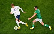 17 November 2022; Martin Ødegaard of Norway and Josh Cullen of Republic of Ireland during the International Friendly match between Republic of Ireland and Norway at the Aviva Stadium in Dublin. Photo by Ben McShane/Sportsfile