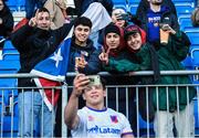 18 November 2022; Chile supporters take a photo with Santiago Videla of Chile after the Bank of Ireland friendly match between Leinster and Chile at Energia Park in Dublin. Photo by Tyler Miller/Sportsfile