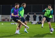 19 November 2022; Dara O'Shea, left, Jeff Hendrick, behind, and Seamus Coleman during a Republic of Ireland training session at the National Stadium training grounds in Ta' Qali, Malta. Photo by Seb Daly/Sportsfile