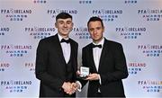 19 November 2022; David Harrington of Cork City, left, is presented with his PFA Ireland First Division Team of the Year Medal by PFA Ireland Chairperson Brendan Clarke during the PFA Ireland Awards 2022 at the Marker Hotel in Dublin. Photo by Sam Barnes/Sportsfile