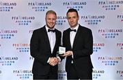 19 November 2022; Kevin O'Connor of Cork City, left, is presented with his PFA Ireland First Division Team of the Year Medal by PFA Ireland Chairperson Brendan Clarke during the PFA Ireland Awards 2022 at the Marker Hotel in Dublin. Photo by Sam Barnes/Sportsfile