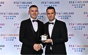 19 November 2022; Killian Brouder of Galway United, left, is presented with his PFA Ireland First Division Team of the Year Medal by PFA Ireland Chairperson Brendan Clarke during the PFA Ireland Awards 2022 at the Marker Hotel in Dublin. Photo by Sam Barnes/Sportsfile