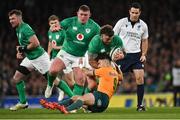 19 November 2022; Andrew Porter of Ireland is tackled by Nic White of Australia during the Bank of Ireland Nations Series match between Ireland and Australia at the Aviva Stadium in Dublin. Photo by Harry Murphy/Sportsfile