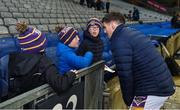 19 November 2022; Nine year old Kilmacud Crokes supporters, left to right, Arron Lynch, Eoin and Killian Sheridan in conversation with Shane Walsh of Kilmacud Crokes after the AIB Leinster GAA Football Senior Club Championship Semi-Final match between Portarlington and Kilmacud Crokes at Croke Park in Dublin. Photo by Daire Brennan/Sportsfile