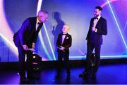 19 November 2022; MC Des Curran, left, speaking with Josh Bradley, son of Shamrock Rovers manager Stephen Bradley, and Roberto Lopes of Shamrock Rovers during the PFA Ireland Awards 2022 at the Marker Hotel in Dublin. Photo by Sam Barnes/Sportsfile