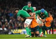 19 November 2022; Andrew Porter of Ireland is tackled by Rob Valentini of Australia during the Bank of Ireland Nations Series match between Ireland and Australia at the Aviva Stadium in Dublin. Photo by Harry Murphy/Sportsfile