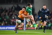 19 November 2022; Jimmy O'Brien of Ireland kicks under pressure from Jake Gordon of Australia during the Bank of Ireland Nations Series match between Ireland and Australia at the Aviva Stadium in Dublin. Photo by Harry Murphy/Sportsfile