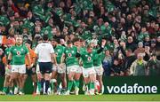 19 November 2022; Craig Casey of Ireland, right, celebrates his side's first try, scored by teammate Bundee Aki, during the Bank of Ireland Nations Series match between Ireland and Australia at the Aviva Stadium in Dublin. Photo by Ramsey Cardy/Sportsfile