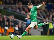 19 November 2022; Jack Crowley of Ireland, wearing the embroidered jersey of injured teammate Jonathan Sexton, kicks a conversion during the Bank of Ireland Nations Series match between Ireland and Australia at the Aviva Stadium in Dublin. Photo by Harry Murphy/Sportsfile