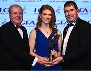 19 November 2022; Louise Ní Mhuircheartaigh of Kerry is presented with her TG4 LGFA All Star award by Ard Stiúrthóir TG4 Alan Esslemont, left, and President of the LGFA Mícheál Naughton during the TG4 All-Ireland Ladies Football All Stars Awards banquet, in association with Lidl, at the Bonnington Dublin Hotel. Photo by Eóin Noonan/Sportsfile