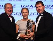 19 November 2022; Stacey Grimes of Meath is presented with her TG4 LGFA All Star award by Ard Stiúrthóir TG4 Alan Esslemont, left, and President of the LGFA Mícheál Naughton  during the TG4 All-Ireland Ladies Football All Stars Awards banquet, in association with Lidl, at the Bonnington Dublin Hotel. Photo by Eóin Noonan/Sportsfile