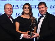 19 November 2022; Aimee Mackin of Armagh is presented with her TG4 LGFA All Star award by Ard Stiúrthóir TG4 Alan Esslemont, left, and President of the LGFA Mícheál Naughton during the TG4 All-Ireland Ladies Football All Stars Awards banquet, in association with Lidl, at the Bonnington Dublin Hotel. Photo by Eóin Noonan/Sportsfile