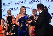 19 November 2022; TG4 Senior Players Player of the Year Niamh McLaughlin of Donegal is interviewed by MC Marty Morrissey during the TG4 All-Ireland Ladies Football All Stars Awards banquet, in association with Lidl, at the Bonnington Dublin Hotel. Photo by Eóin Noonan/Sportsfile