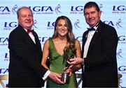 19 November 2022; Danielle Caldwell of Mayo is presented with her TG4 LGFA All Star award by Ard Stiúrthóir TG4 Alan Esslemont, left, and President of the LGFA Mícheál Naughton during the TG4 All-Ireland Ladies Football All Stars Awards banquet, in association with Lidl, at the Bonnington Dublin Hotel. Photo by Eóin Noonan/Sportsfile