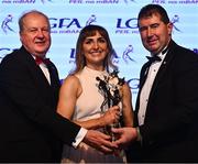 19 November 2022; Cáit Lynch of Kerry is presented with her TG4 LGFA All Star award by Ard Stiúrthóir TG4 Alan Esslemont, left, and President of the LGFA Mícheál Naughton during the TG4 All-Ireland Ladies Football All Stars Awards banquet, in association with Lidl, at the Bonnington Dublin Hotel. Photo by Eóin Noonan/Sportsfile