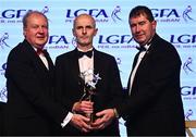 19 November 2022; Brian Troy accepts a TG4 LGFA All Star award on behalf of his daughter Emma Troy of Meath during the TG4 All-Ireland Ladies Football All Stars Awards banquet, in association with Lidl, at the Bonnington Dublin Hotel. Photo by Eóin Noonan/Sportsfile