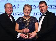 19 November 2022; Bridie Howley accepts a TG4 LGFA All Star award on behalf of her daughter Shauna Howley of Mayo from Ard Stiúrthóir TG4 Alan Esslemont, left, and President of the LGFA Mícheál Naughton during the TG4 All-Ireland Ladies Football All Stars Awards banquet, in association with Lidl, at the Bonnington Dublin Hotel. Photo by Eóin Noonan/Sportsfile