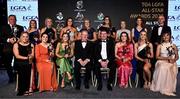 19 November 2022; Ard Stiúrthóir TG4 Alan Esslemont, front-row left, and President of the LGFA Mícheál Naughton with award winners; front row, from left, Monica McGuirk of Meath, Shauna Ennis of Meath, Danielle Caldwell of Mayo, Aishling O’Connell of Kerry Aoibhín Cleary of Meath and  Cáit Lynch of Kerry. Back row, from left, James Cronin, father of Kayleigh Cronin of Kerry, Niamh McLaughlin of Donegal, Niamh Carmody of Kerry, Emma Duggan of Meath, Bridie Howley, mother of Shauna Howley of Mayo, Aimee Mackin of Armagh, Stacey Grimes of Meath, Louise Ní Mhuircheartaigh of Kerry and Brian Troy, father of Emma Troy of Meath, during the TG4 All-Ireland Ladies Football All Stars Awards banquet, in association with Lidl, at the Bonnington Dublin Hotel. Photo by Eóin Noonan/Sportsfile