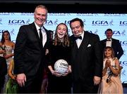 19 November 2022; MC Dáithí Ó Sé, left, and Marty Morrissey with Aoife Ramsbottom from Laois during the TG4 All-Ireland Ladies Football All Stars Awards banquet, in association with Lidl, at the Bonnington Dublin Hotel. Photo by Eóin Noonan/Sportsfile