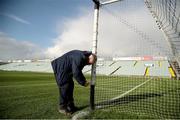 20 November 2022; Groundsman Eugene Griffin tends to the goal netting before the AIB Munster GAA Hurling Senior Club Championship Semi-Final match between Na Piarsaigh and Ballygunner at TUS Gaelic Grounds in Limerick. Photo by Michael P Ryan/Sportsfile