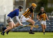 20 November 2022; Gary Brennan of Ballyea shoots past Damien Cahalane of St Finbarr’s to score his side's first goal during the AIB Munster GAA Hurling Senior Club Championship Semi-Final match between Ballyea and St Finbarr's at Cusack Park in Ennis, Clare. Photo by Daire Brennan/Sportsfile