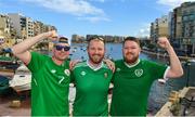 20 November 2022; Republic of Ireland supporters, from left, Dáire Coughlan, Denis Grennell and Andrew Horgan, from Bishopstown, Cork, pose for a photograph in Spinola Bay, Malta, before the International Friendly match between Malta and Republic of Ireland at the Ta' Qali National Stadium in Attard, Malta. Photo by Seb Daly/Sportsfile