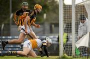 20 November 2022; An umpire reaches for the green flag as Gary Brennan of Ballyea celebrates scoring his first half goal with team mate Aaron Griffin, left, during the AIB Munster GAA Hurling Senior Club Championship Semi-Final match between Ballyea and St Finbarr's at Cusack Park in Ennis, Clare. Photo by Daire Brennan/Sportsfile