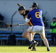20 November 2022; Niall Deasy of Ballyea in action against Damien Cahalane of St Finbarr’s during the AIB Munster GAA Hurling Senior Club Championship Semi-Final match between Ballyea and St Finbarr's at Cusack Park in Ennis, Clare. Photo by Daire Brennan/Sportsfile