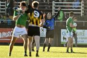 20 November 2022; Referee John Gilmartin shows David Butler of Strokestown, hidden, a black card during the AIB Connacht GAA Football Senior Club Championship Semi-Final match between Moycullen and Strokestown at Tuam Stadium in Tuam, Galway. Photo by Sam Barnes/Sportsfile