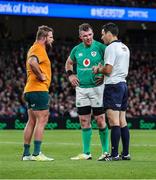 19 November 2022; Referee Ben O’Keeffe has a talk with both captains James Slipper of Australia and Peter O’Mahony of Ireland during the Bank of Ireland Nations Series match between Ireland and Australia at the Aviva Stadium in Dublin. Photo by John Dickson/Sportsfile