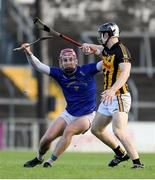 20 November 2022; Ben O’Connor of St Finbarr’s in action against Pearse Lillis of Ballyea during the AIB Munster GAA Hurling Senior Club Championship Semi-Final match between Ballyea and St Finbarr's at Cusack Park in Ennis, Clare. Photo by Daire Brennan/Sportsfile