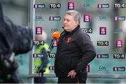 20 November 2022; Ballygunner manager Darragh O'Sullivan is interviewed by TG4 before the AIB Munster GAA Hurling Senior Club Championship Semi-Final match between Na Piarsaigh and Ballygunner at TUS Gaelic Grounds in Limerick. Photo by Michael P Ryan/Sportsfile